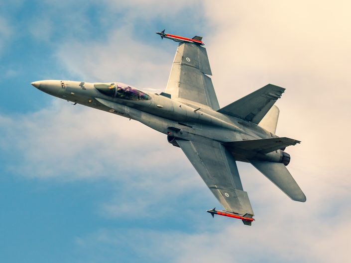 Fighter jet performing aerial maneuver